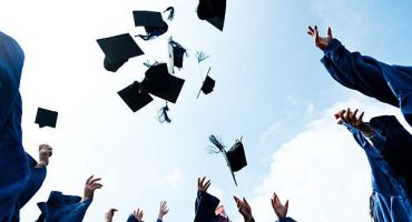 throwing-graduation-hats-picture